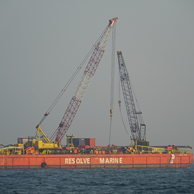 Resolve Marine barge with a large crane is pictured